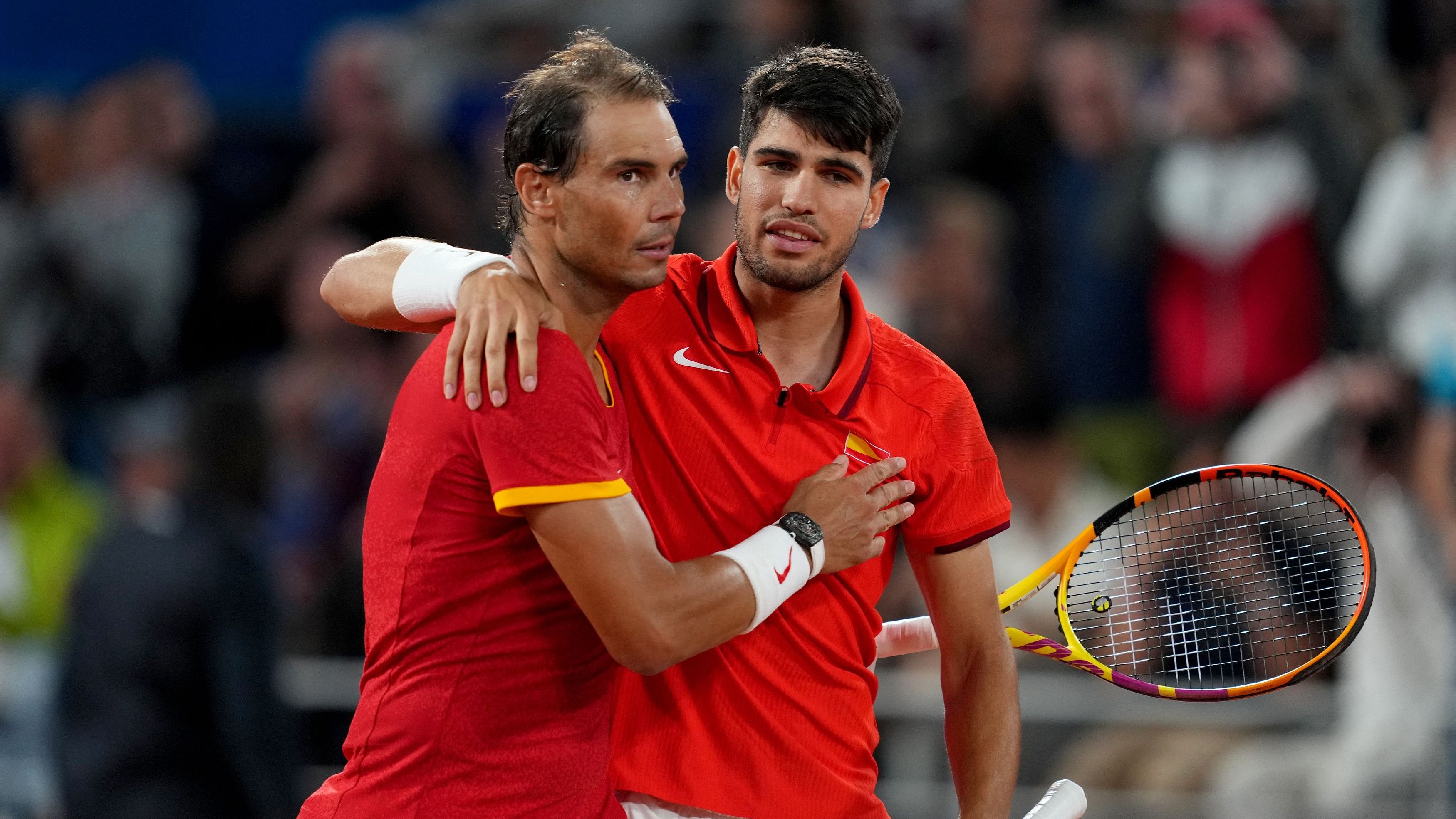 <div class="paragraphs"><p>arlos Alcaraz of Spain and Rafael Nadal of Spain celebrate after winning their first round match against Maximo Gonzalez of Argentina and Andres Molteni of Argentina.</p></div>